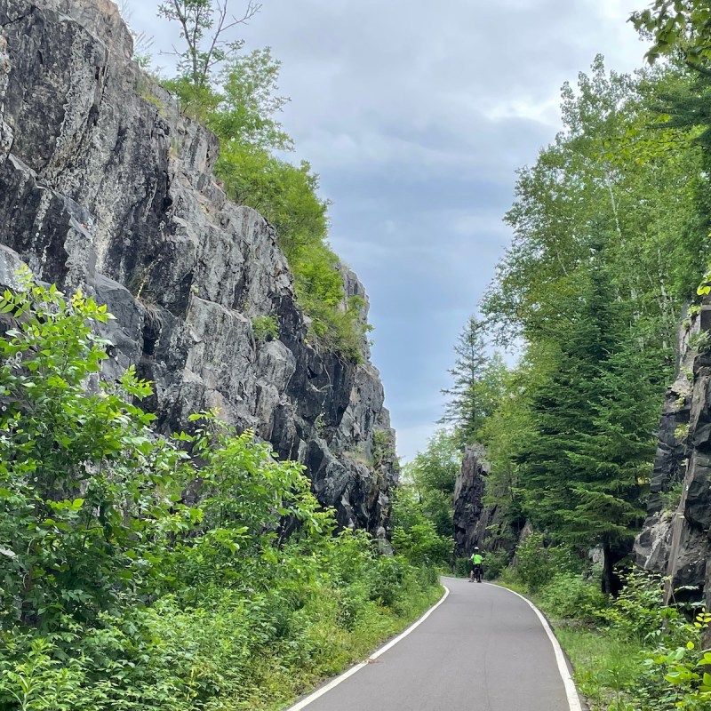 Biking along the Willard Munger State Trail, stretching from Hinkley To Duluth, Minnesota