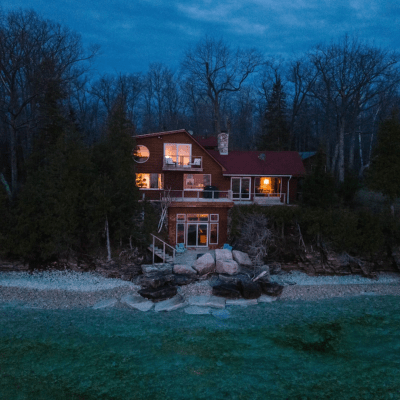 shot facing Wisconsin cabin in the woods on the water