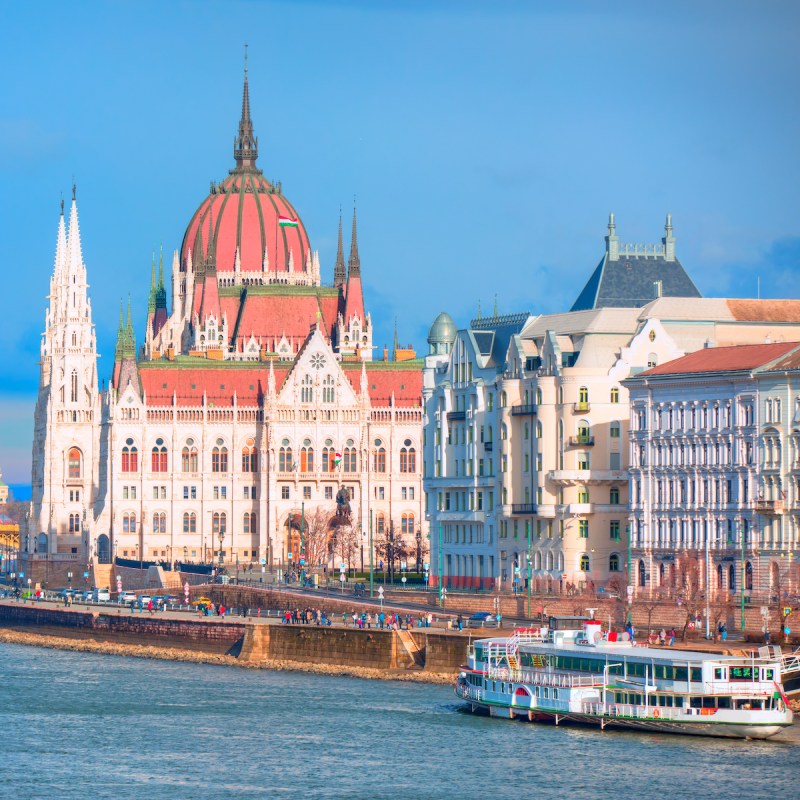 Budapest Parliament building at dusk on the Danube river - Budapest, Hungary