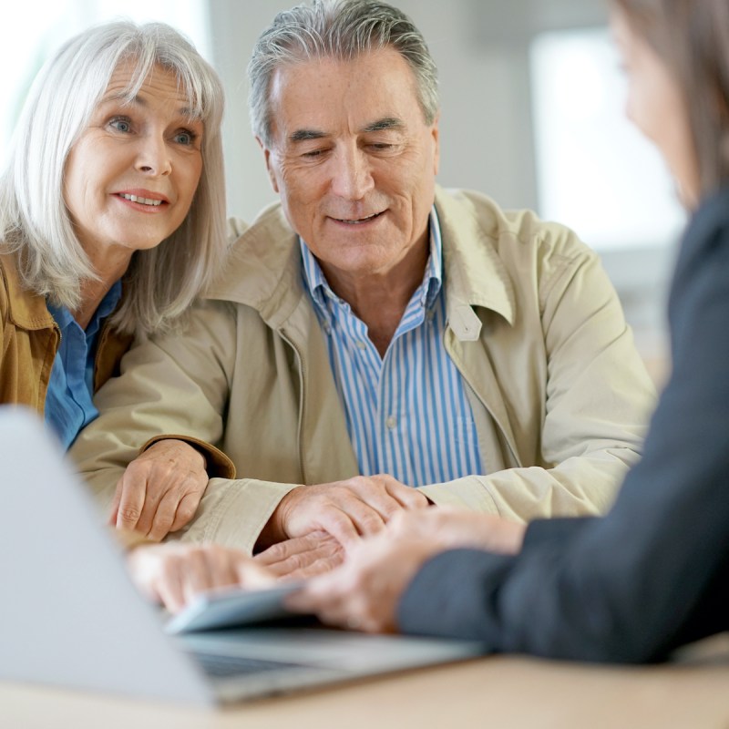 Elderly couple meeting financial advisor