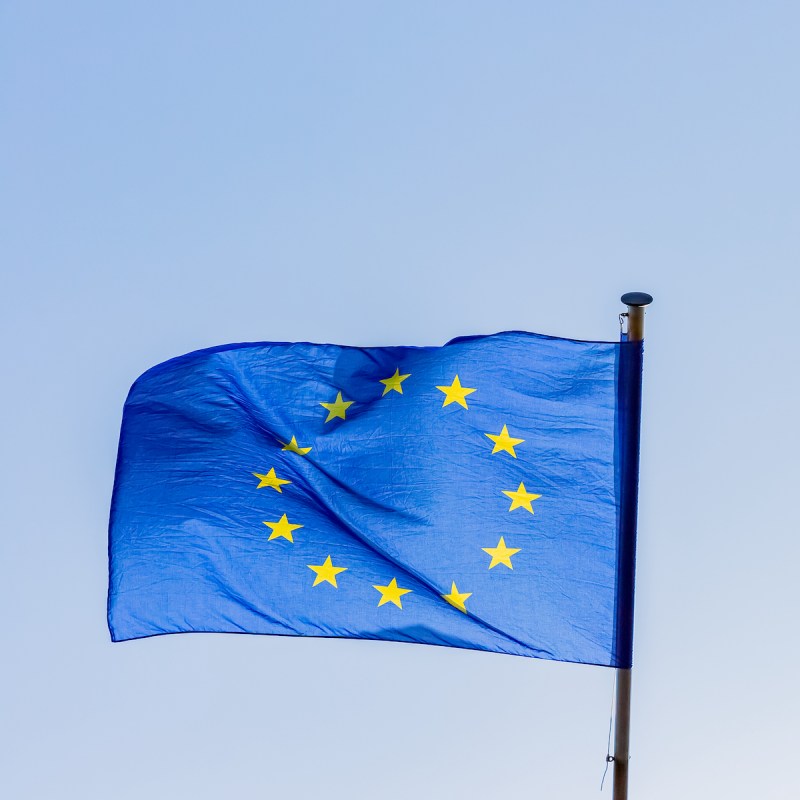 European union flag on blue sky background