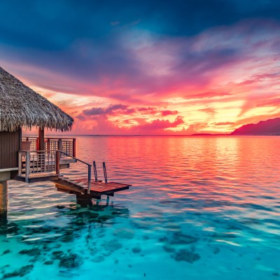 Stunning colorful sunset sky on the horizon of Moorea, the South Pacific Ocean.