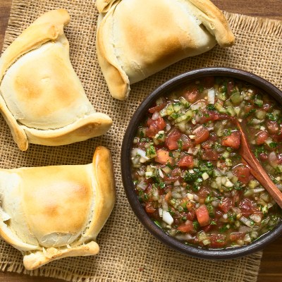 Pebre salsa and empanadas de pino