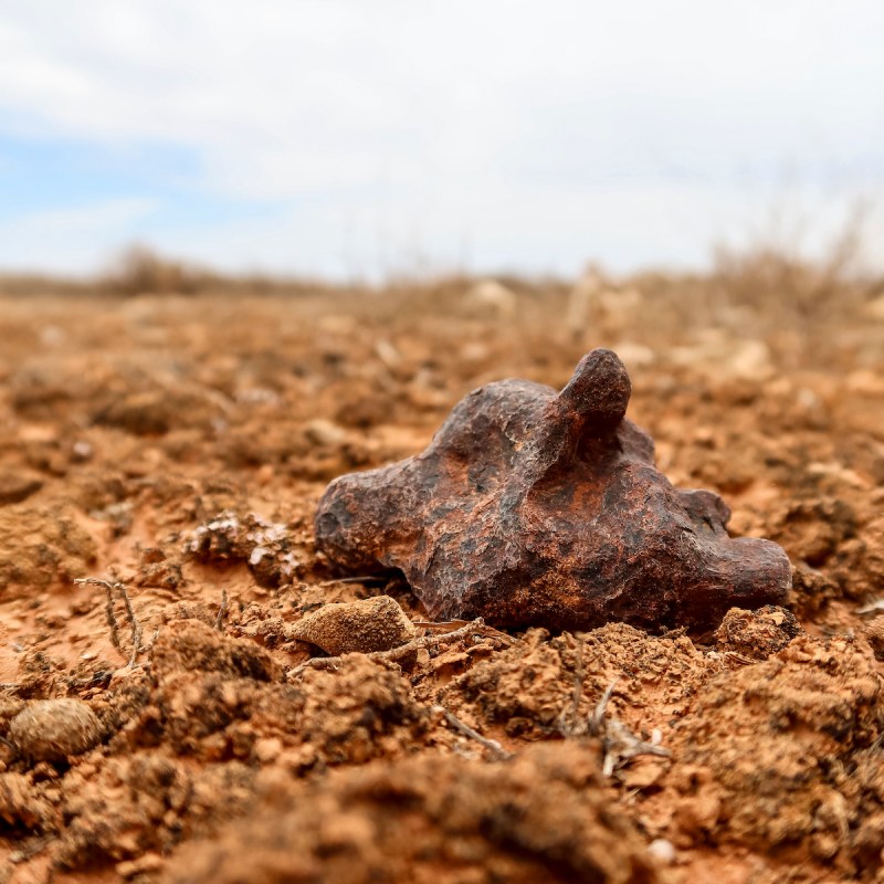 smooth meteorite remnant in a field