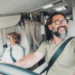 couple driving RV