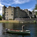 A lone fisherman casting for a lucky catch outside of the Ashford Castle