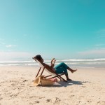 on a beach mature woman