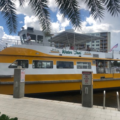 The water taxi stopped to pick up passengers