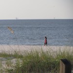 Taking a midday stroll along the East End Beach on Dauphin Island