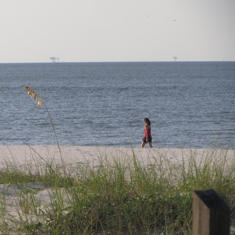 Taking a midday stroll along the East End Beach on Dauphin Island