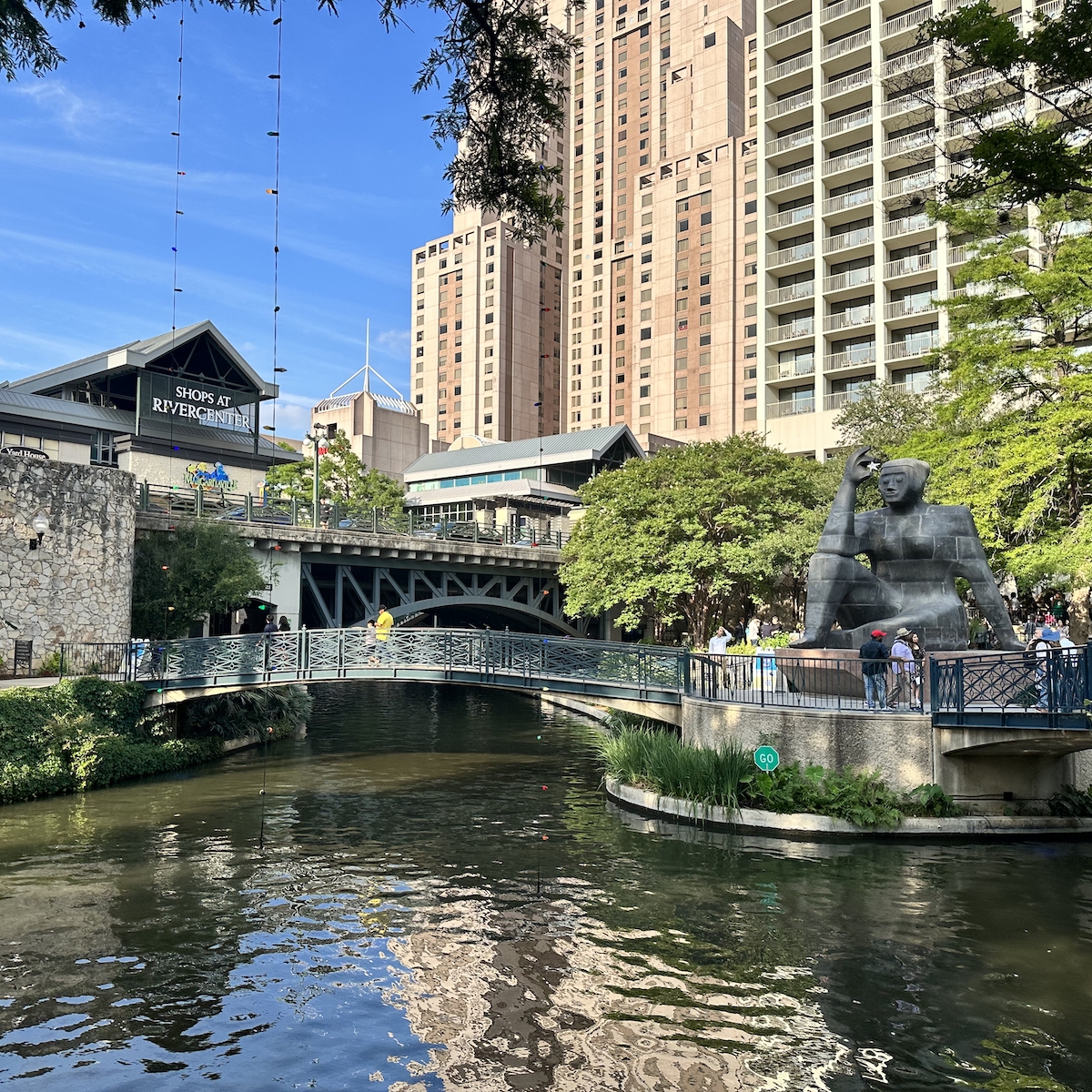 The San Antonio River Walk showing its newest public art statue