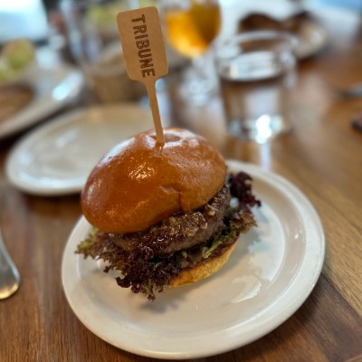 The towering Oko burger at Oko is a star on the menu with a mix of ingredients