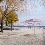 Pink umbrellas at Sugar Beach in Toronto