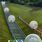 Zorbs being transferred up the hill at the Outdoor Gravity Park