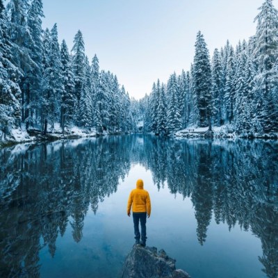 Person In Winter Forest: Skin Care for Winter Travel