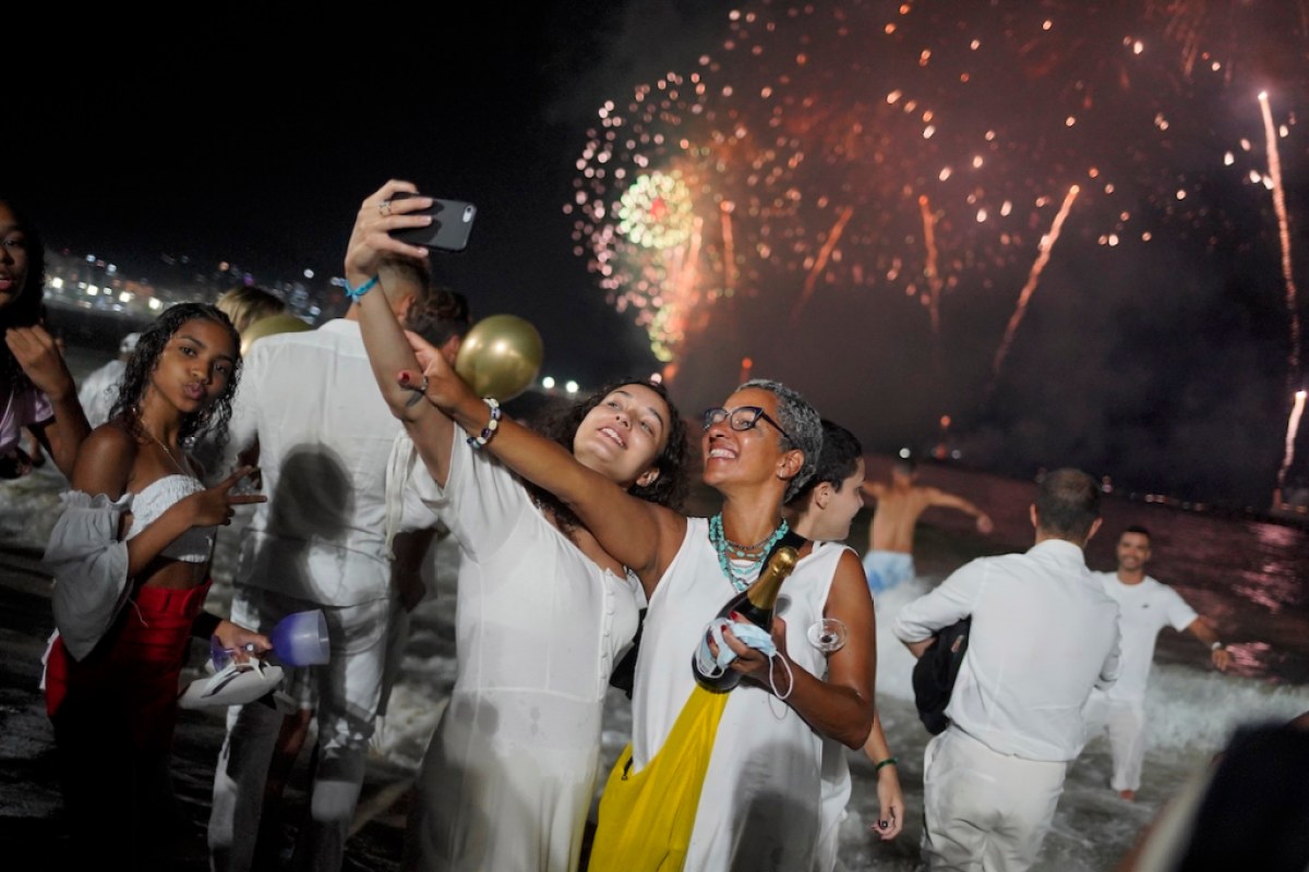New Years on Copacabana Beach in Rio de Janeiro, with revelers dressed in their all-white outfits