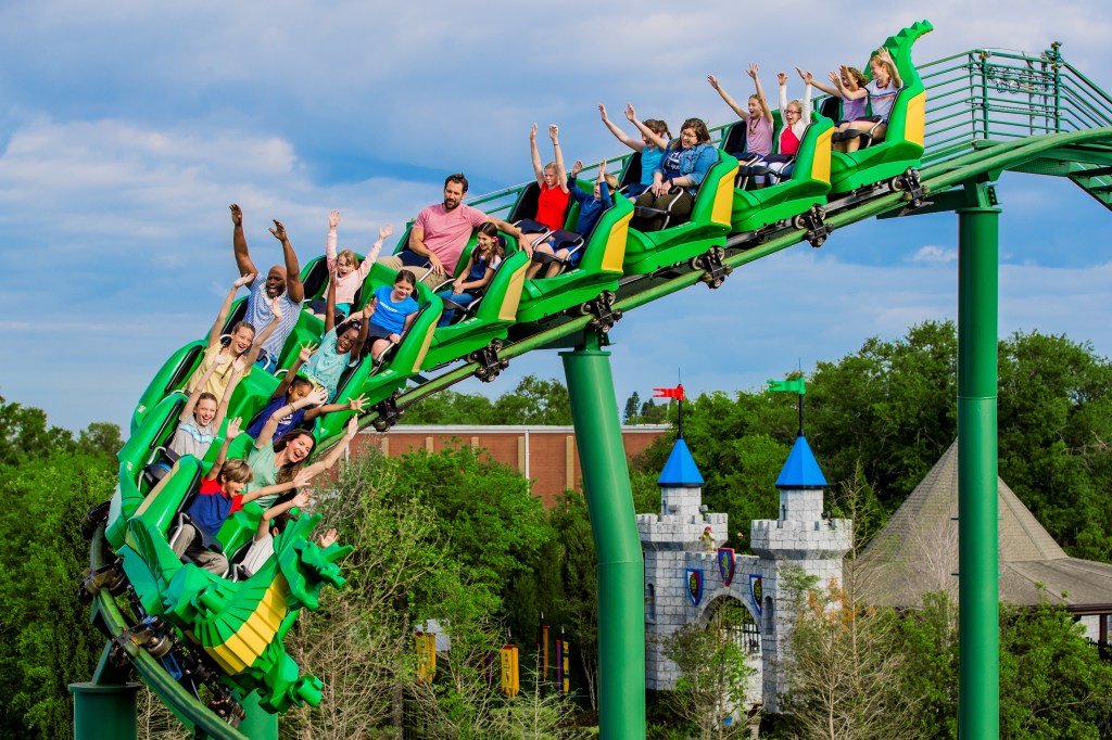 People riding a coaster in Legoland