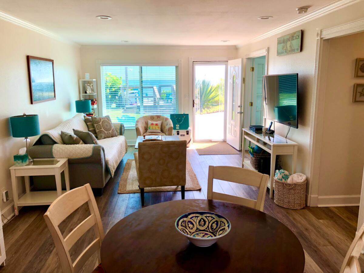 View of the living room of the Sea Turtle Suite 2, Oceanfront boutique cottage at Serenity in Melbourne Beach!