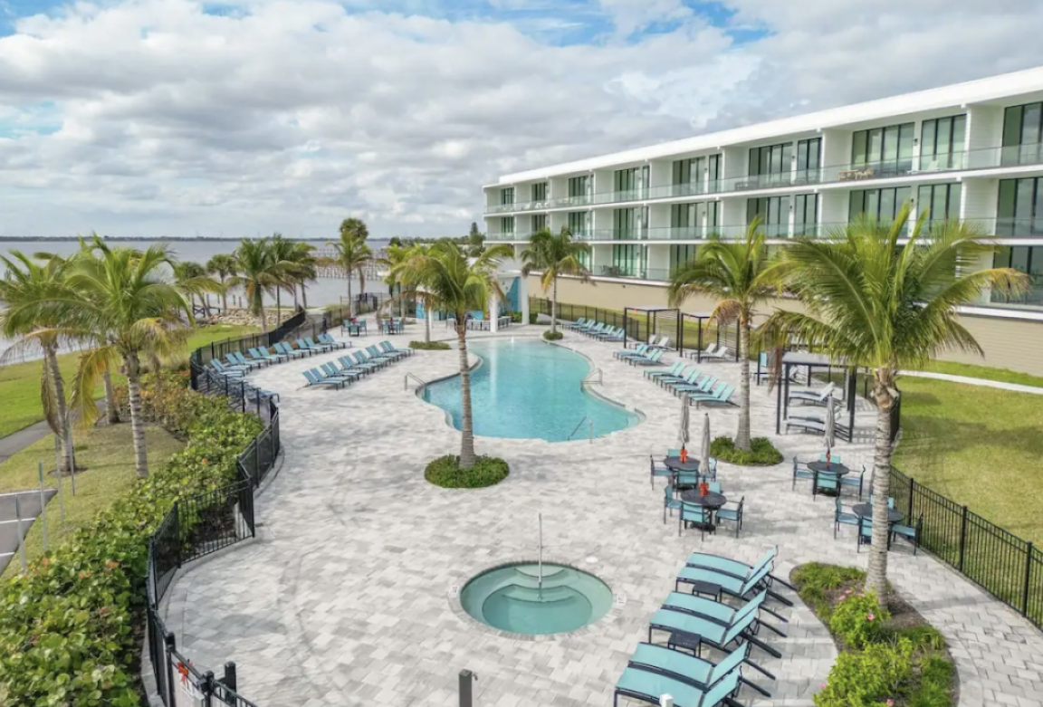 Pool view of the Harbor Island beach house with private and public pools