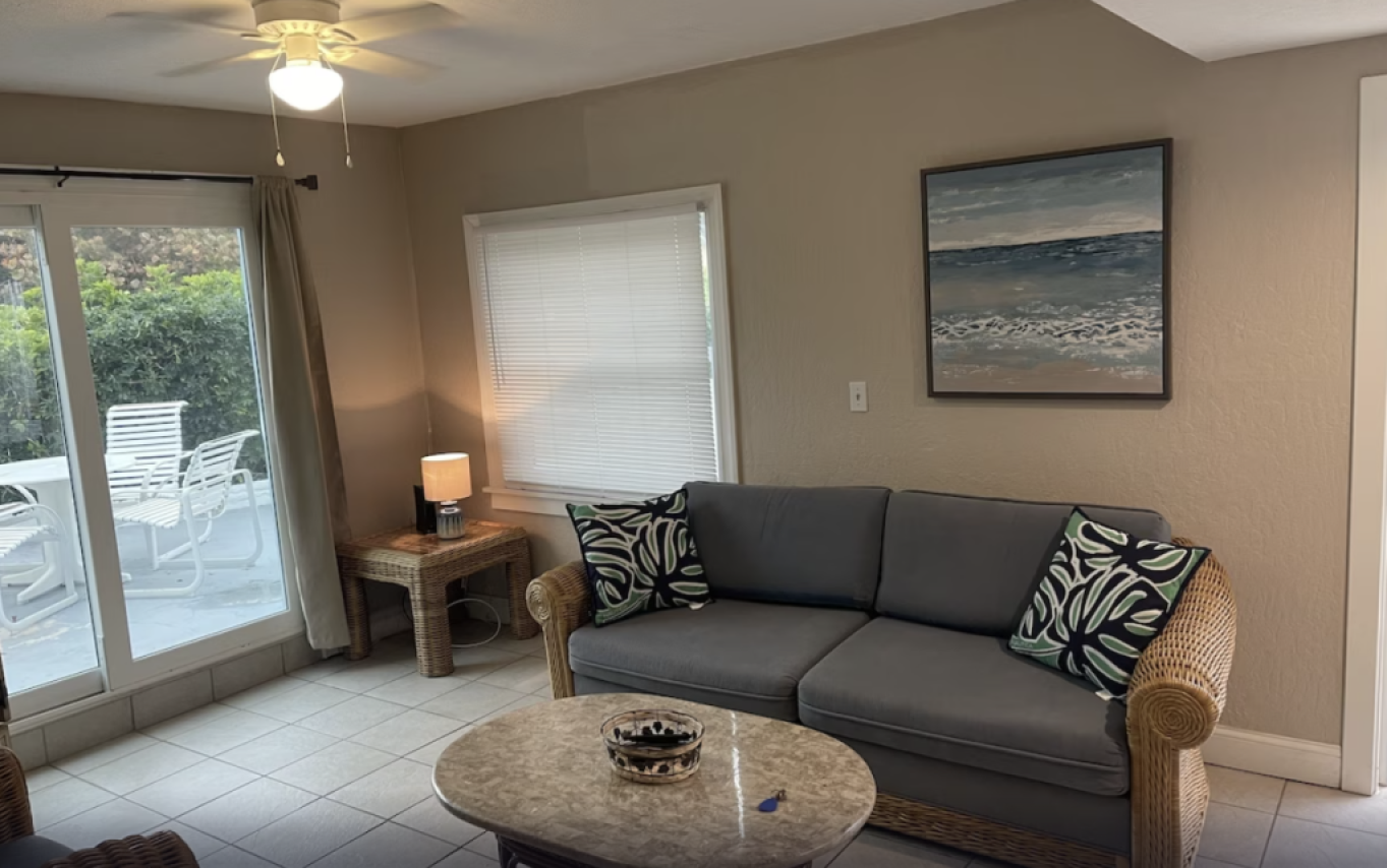 View of the living room of the Ocean Front with Patio and Private Beach Access