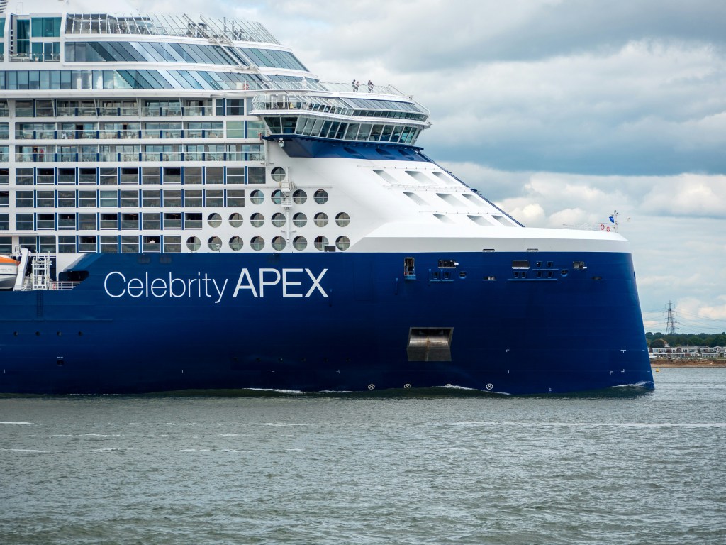 Large Blue and white Celebrity cruise ship in the water